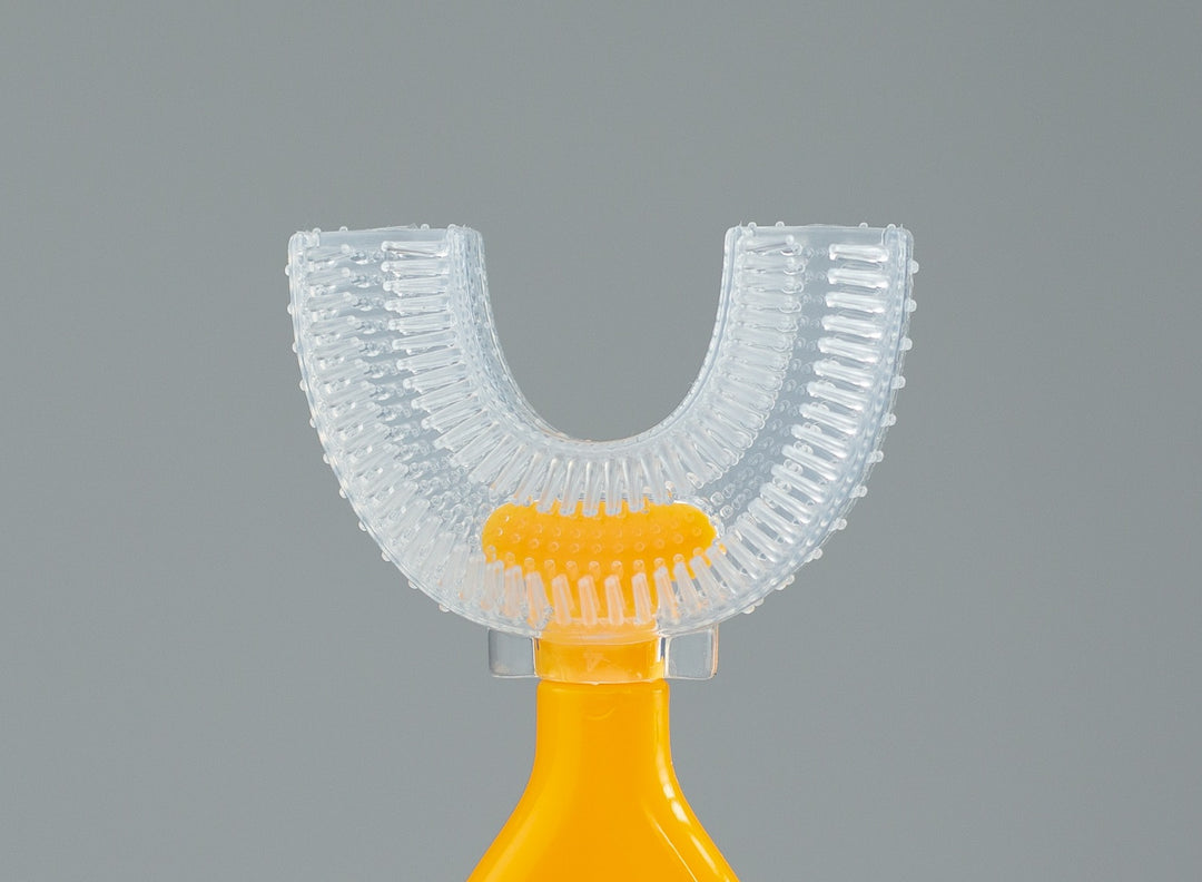 Cepillo de dientes de silicona en forma de U para niños